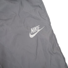 Load image into Gallery viewer, Vintage 80s Nike Blue Tag Windbreaker Track Pants - L