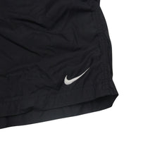 Load image into Gallery viewer, Vintage Nike Spellout Swim Trunks - L