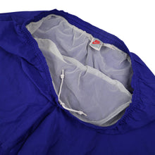 Load image into Gallery viewer, Vintage 90s Nike Big Spellout Swim Trunks. Features 90s gray tag - L