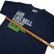 Load image into Gallery viewer, Vintage Nike Track Town USA &quot;Run Like Hell Today&quot; Graphic T Shirt - S