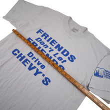 Load image into Gallery viewer, Vintage " Friends Don't Let Friends Drive Chevys" Slogan T shirt - XL