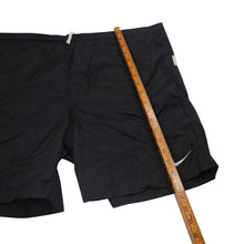 Load image into Gallery viewer, Vintage Nike Spellout Swim Trunks - L
