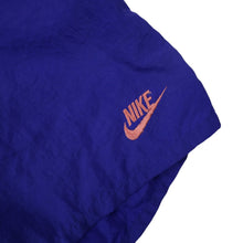 Load image into Gallery viewer, Vintage 90s Nike Big Spellout Swim Trunks. Features 90s gray tag - L
