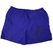 Load image into Gallery viewer, Vintage 90s Nike Big Spellout Swim Trunks. Features 90s gray tag - L
