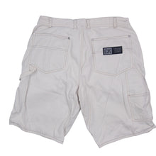 Load image into Gallery viewer, Vintage Calvin Klein Jean Shorts - 33"